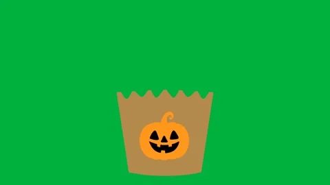 Animation of halloween candy falling into a bag, animated on a green screen back Stock Footage 318079732