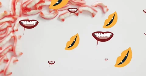 Animation of halloween vampire teeth moving over sweets on grey background Stock Footage 328633926
