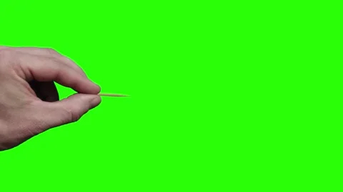Animation of hand to pop a translucent bubble with toothpick on green screen Stock Footage 321740167