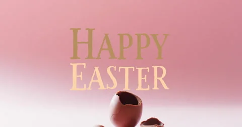 Animation of happy easter text over cracked chocolate easter egg on pink Stock Footage 265542963