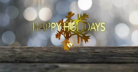 Animation of happy holidays text over christmas snow flakes on spot lights Stock Footage 253528799