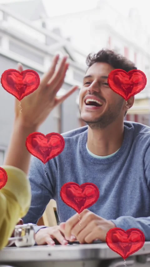 Animation of heart icons floating over happy caucasian couple talking and Vídeo Stock 342097877