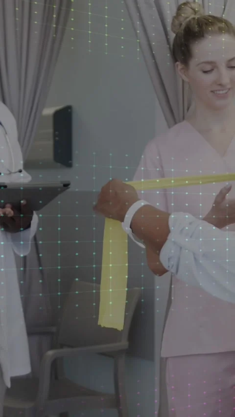 Animation of heartrate monitors over diverse doctors with senior female patient Stock Footage 344706628