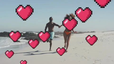 Animation of hearts floating over happy african american couple running on beach Stock Footage