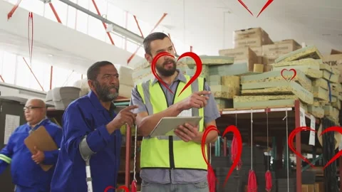 Animation of hearts over diverse workers in warehouse Stock Footage 327714069
