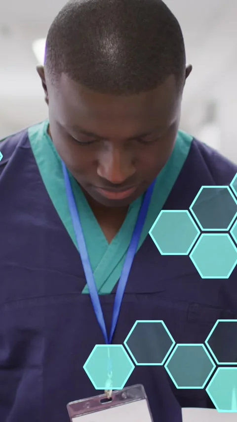 Animation of hexagonal structures processing data over smiling african american Stock Footage 343545507