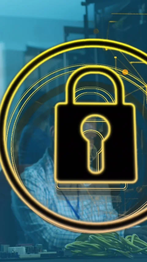 Animation of icon padlock data processing over african american it man by Stock Footage 344706710