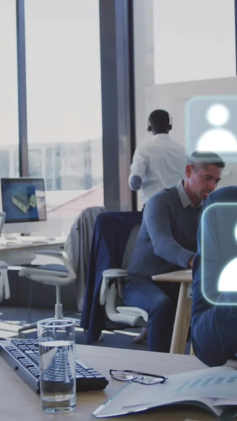 Animation of icons and data processing over diverse business people in office Stockbeeldmateriaal 323897753