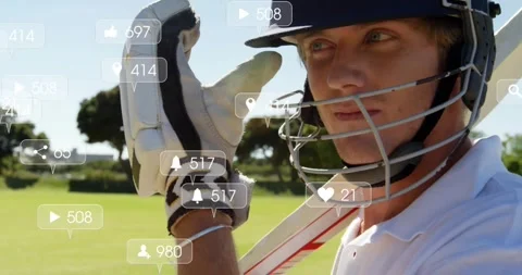 Animation of icons and data processing over caucasian male cricket player Stock Footage 330297174
