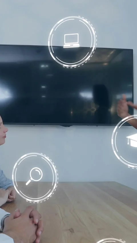 Animation of icons and data processing over diverse business people in office Stock Footage 344774753