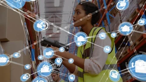 Animation of icons connected by lines over female worker scanning box in Stock Footage 327586703