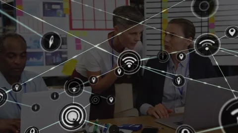 Animation of icons interconnected with lines over coworkers discussing over Stock Footage 329854017