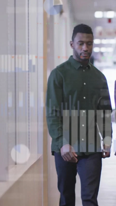 Animation of infographic interface and diverse colleagues discussing project in Stock Footage 341976224