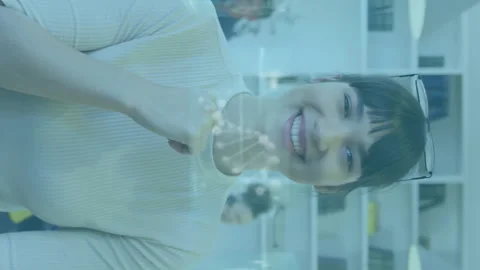 Animation of infographic interface and dnx helix over smiling businesswoman with Stock Footage 313094914
