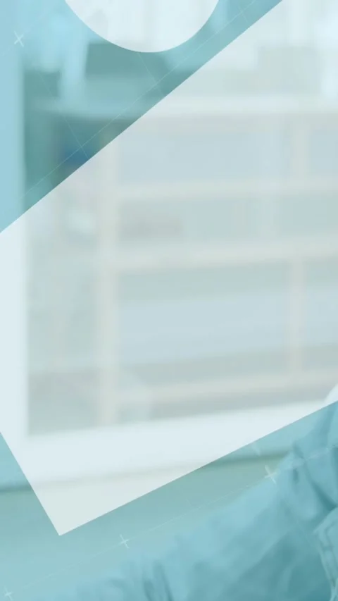 Animation of infographic interface over african american man working on computer Stock Footage 320921714