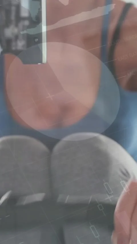 Animation of infographic interface over caucasian woman doing seated cable row Stock Footage 344766078