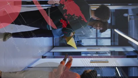 Animation of infographic interface over diverse coworkers discussing folder in Stock Footage 312772667