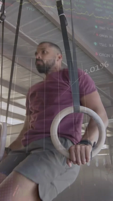 Animation of interface processing data over man training on gym rings at gym Stock Footage 341953541
