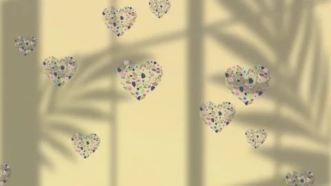 Animation of leaf pattern with hearts on yellow background Stock Footage 156394327