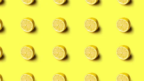 Animation of lemons pattern on yellow background, 4K seamless loop Stock Footage 130481989