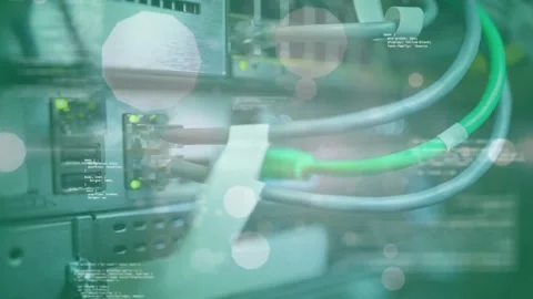 Animation of lens flares, circles, computer language against back panel of Stock Footage 327450490