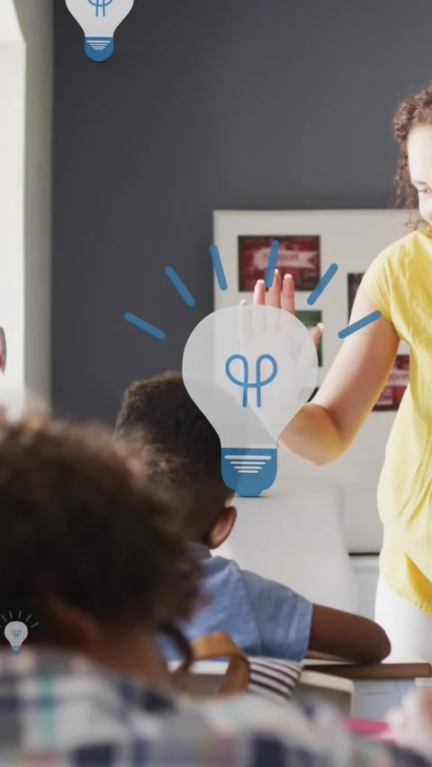 Animation of light bulbs over diverse female teacher and schoolboy high fiving Stock Footage 342643295