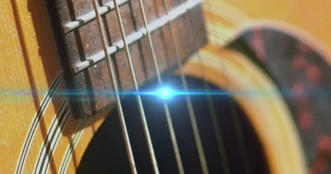 Animation of light flashing over guitar strings moving Stock Footage 329967966
