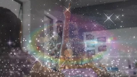 Animation of light spots and trails over diverse schoolchildren and teacher in Stock Footage 327712541