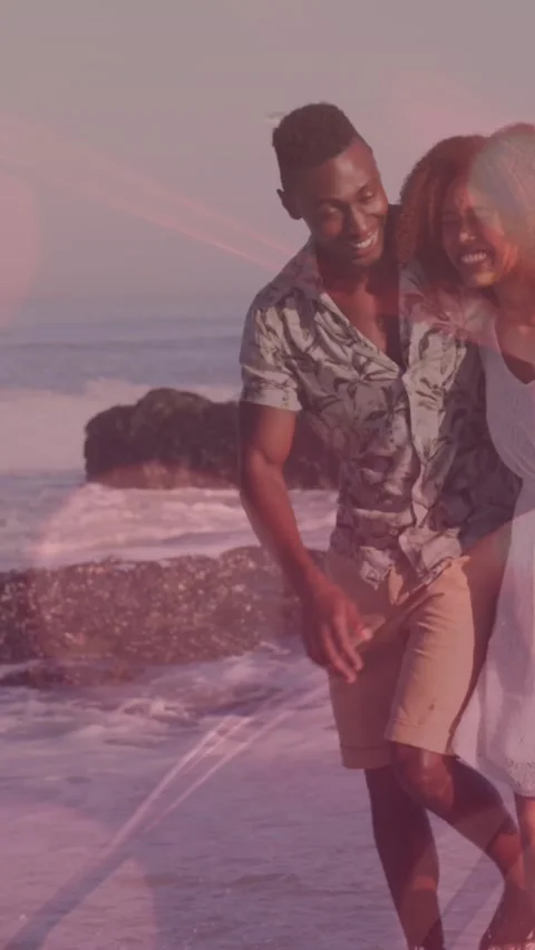 Animation of light spots over african american couple walking and holding hands Vídeo Stock 342315918