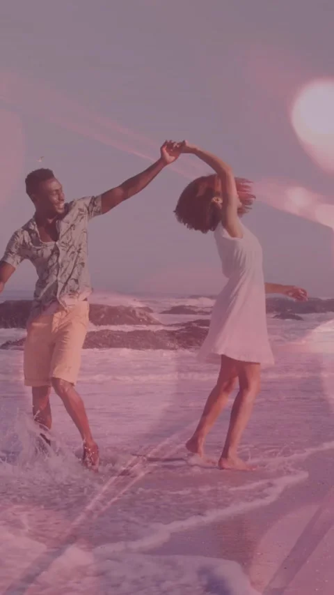 Animation of light spots over african american couple walking and dancing Vídeo Stock 342315919