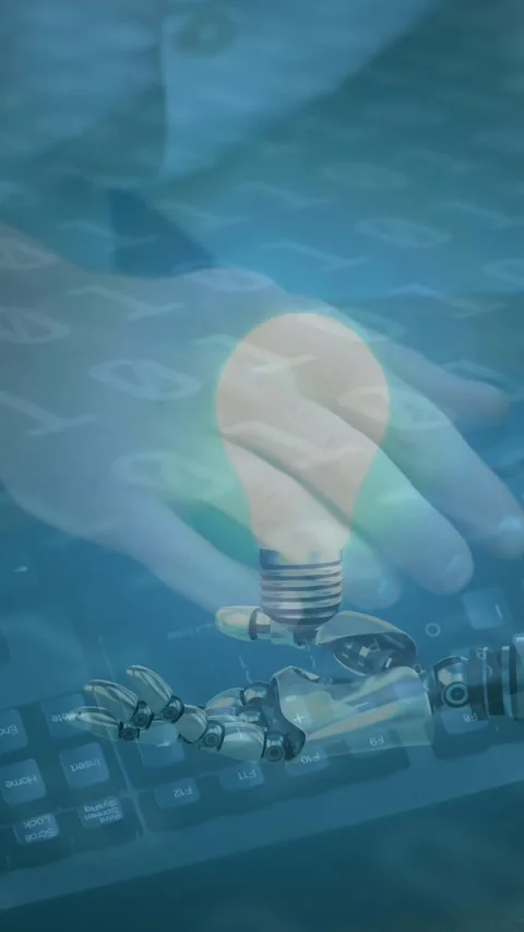Animation of lightbulb over robot's arm, binary coding and man typing on Stock Footage 343824861