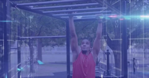 Animation of lights and data processing over male athlete exercising on monkey 動画素材 328918313