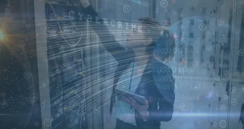 Animation of lines, globe and binary code over caucasian woman checking servers Stock Footage 329709139