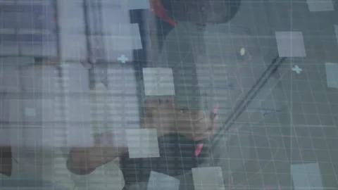 Animation of loading circles and computer language, diverse coworkers discussing Stock Footage 312288736