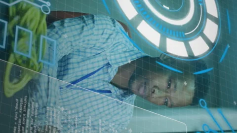 Animation of loading circles, computer language, african american man using Stock Footage 312674971