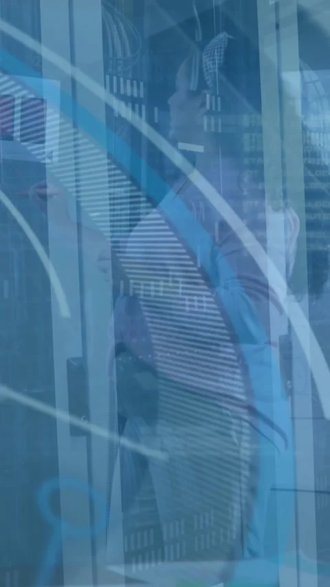Animation of loading circles, computer language, server room against diverse Stock Footage 344283969