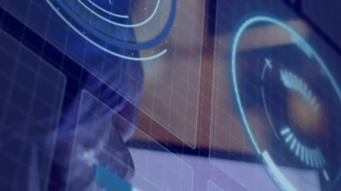 Animation of loading circles, graphs, globe over cropped hands of man working on Stock Footage 313018065