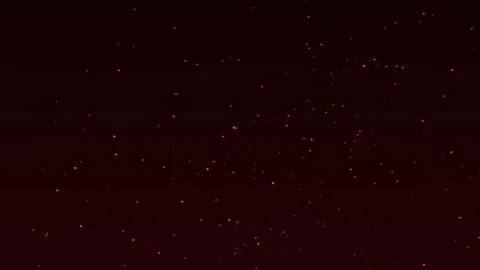 Animation loop of flying sparks on dark background. Sparks flying at night Stock Footage 251409663