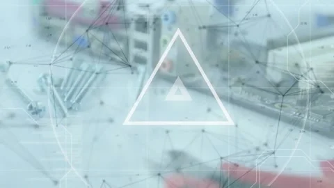 Animation of looping triangles, connected dots, high angle view of electronics Stock Footage 221107778