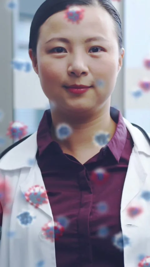 Animation of macro Covid-19 cells floating on a female doctor wearing a lab coat Vídeos de archivo 342608149