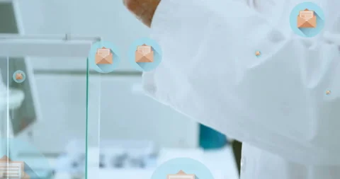 Animation of mail icons and data processing over caucasian male scientist in Stock Footage 310590381