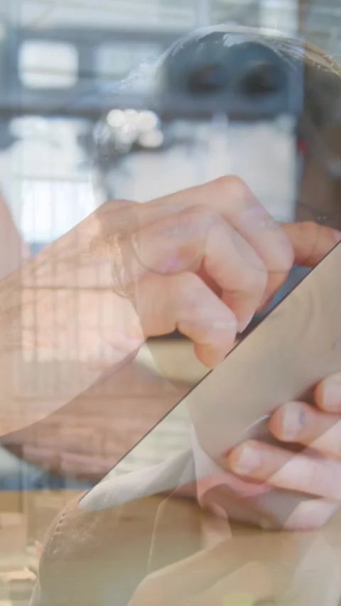 Animation of man using tablet over businessman Vidéo 343954759