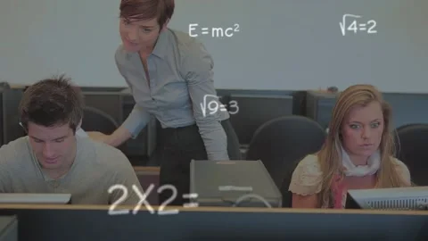 Animation of math formulas over caucasian students using computers Stock Footage 201087549