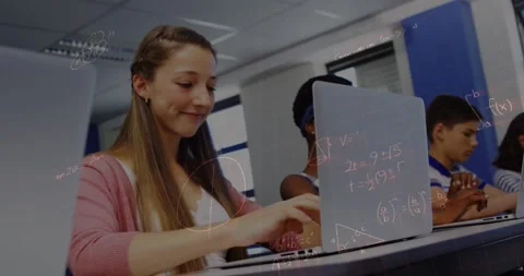 Animation of mathematical equations over students using laptops in classroom Stock Footage 330590480