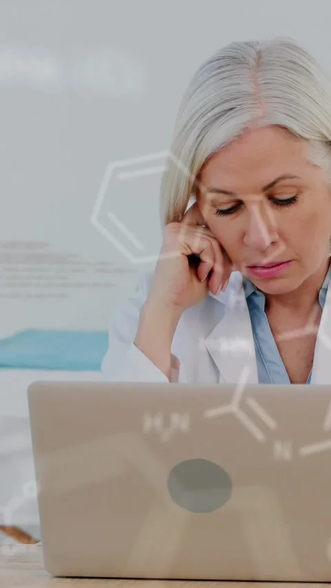 Animation of medical data processing over stressed caucasian female doctor using Stock Footage 344706674