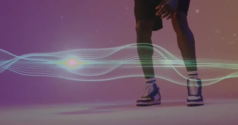 Animation of mesh and neon pattern over african american basketball player Stock Footage 223303222