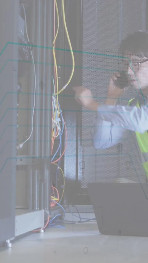 Animation of message block icon over talking on smartphone at server room Stock Footage 342707411
