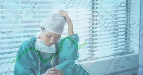 Animation of microprocessor connections and globe over stressed biracial female Vídeo Stock 220903531