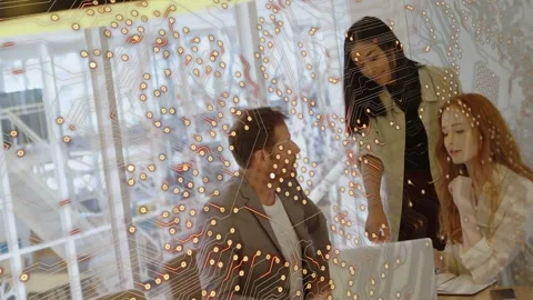 Animation of microprocessor connections over diverse colleagues discussing Stock Footage 202584753