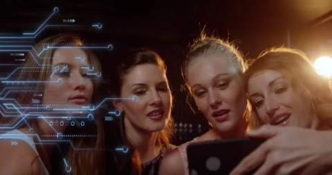 Animation of microprocessor connections over group of diverse female friends Stockbeeldmateriaal 328520045